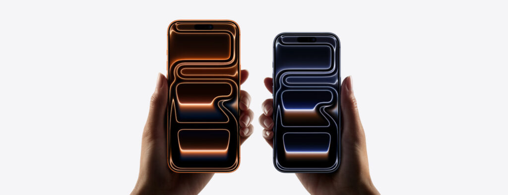 Two hands holding different colored iPhone 17 Pro models